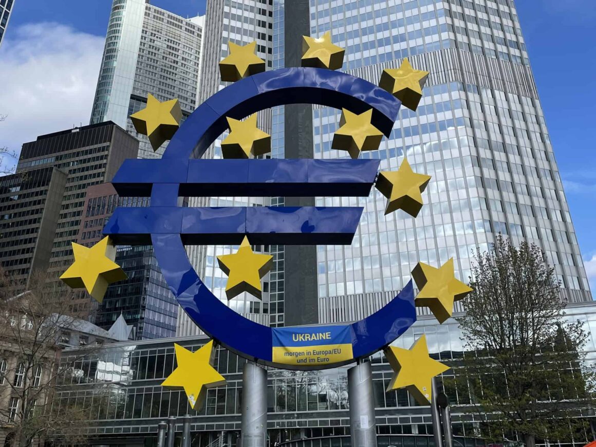 The Euro sign sculpture in Frankfurt am Main โ a symbol of life in Europe on a working holiday