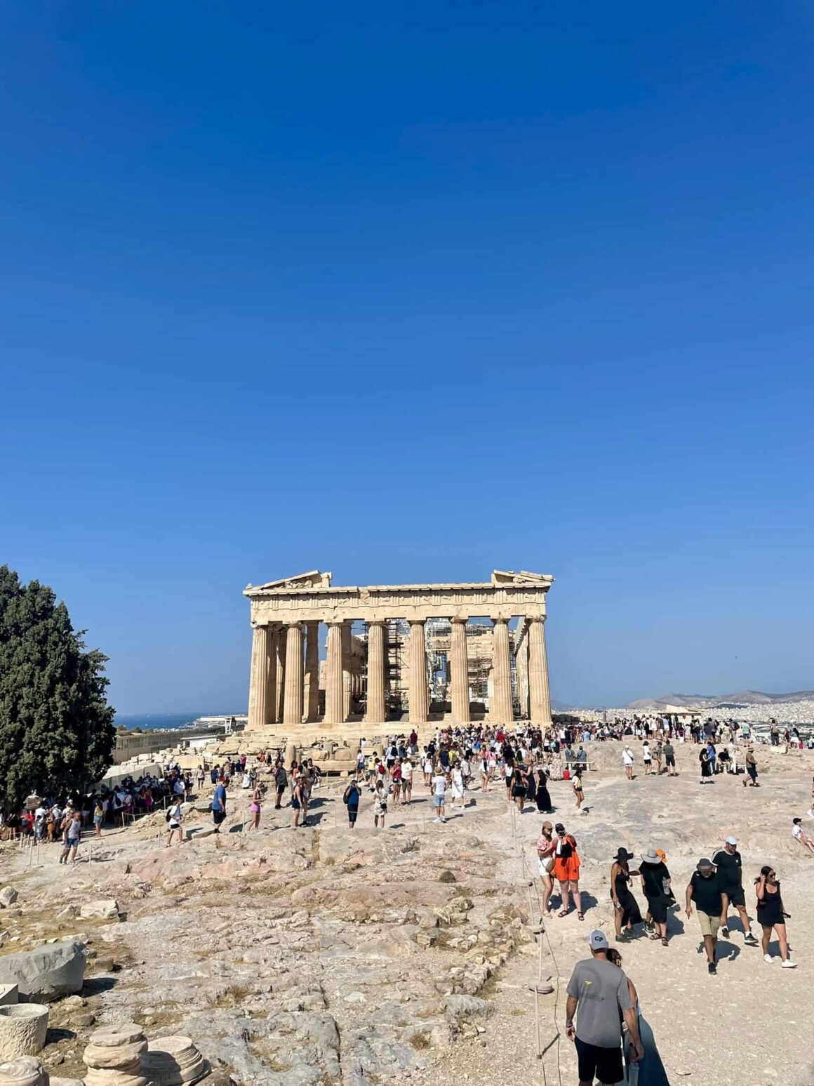 Crowded Acropolis in Athens during peak tourist season — why shoulder season is the best time to visit Europe