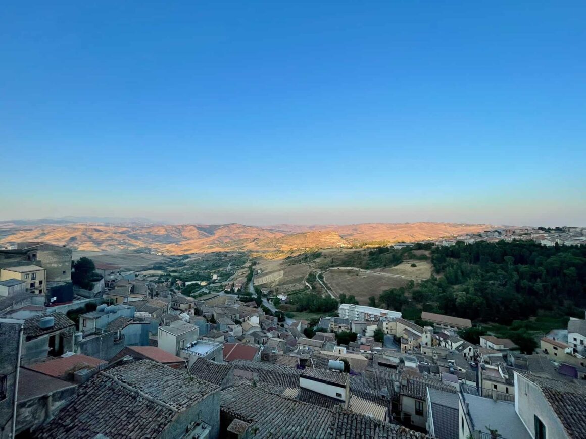 Rolling hills of the Sicilian countryside near Cammarata, Italy — off the beaten track in peak summer