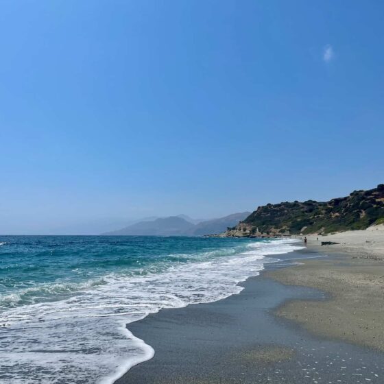 Crystal clear beach on the coast of Crete, Greece — one of the best places to visit in Europe during shoulder season