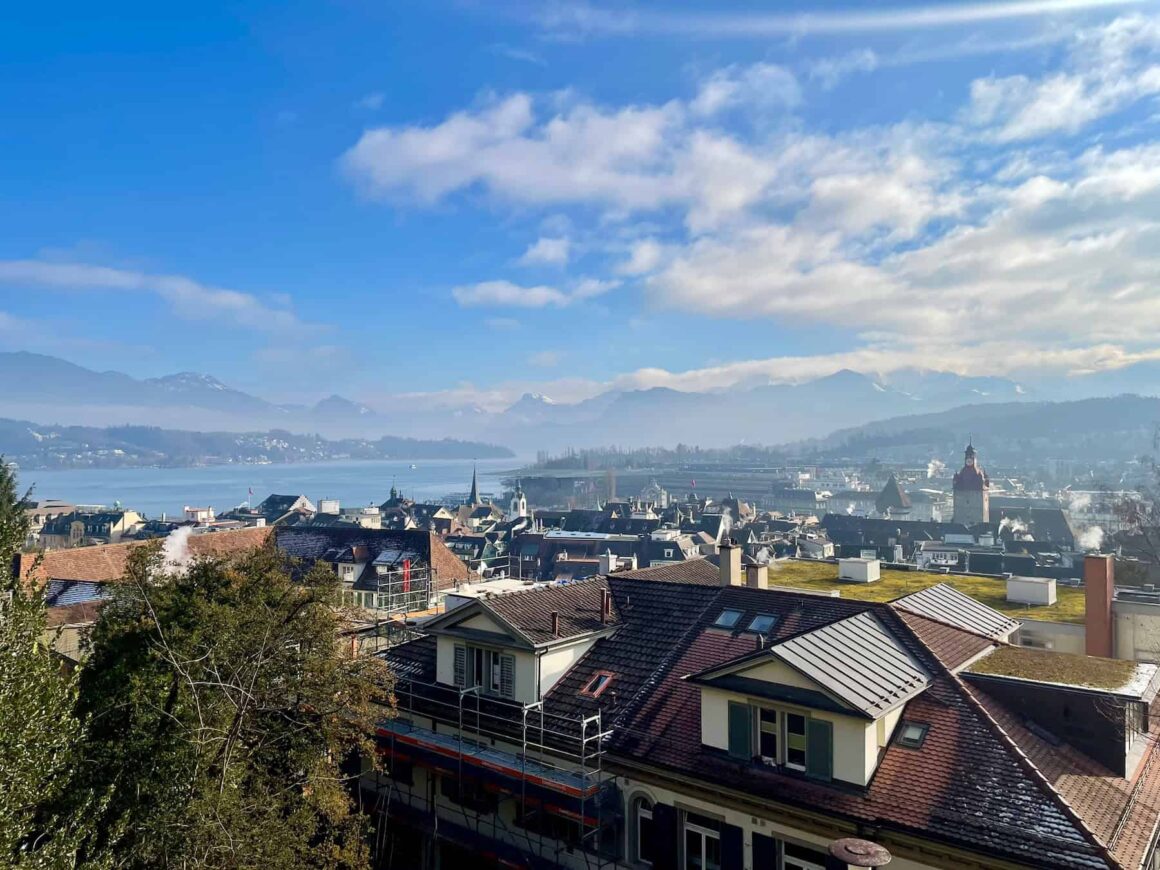 View from the Musegg wall over Luzern townhouses overlooked by the alps