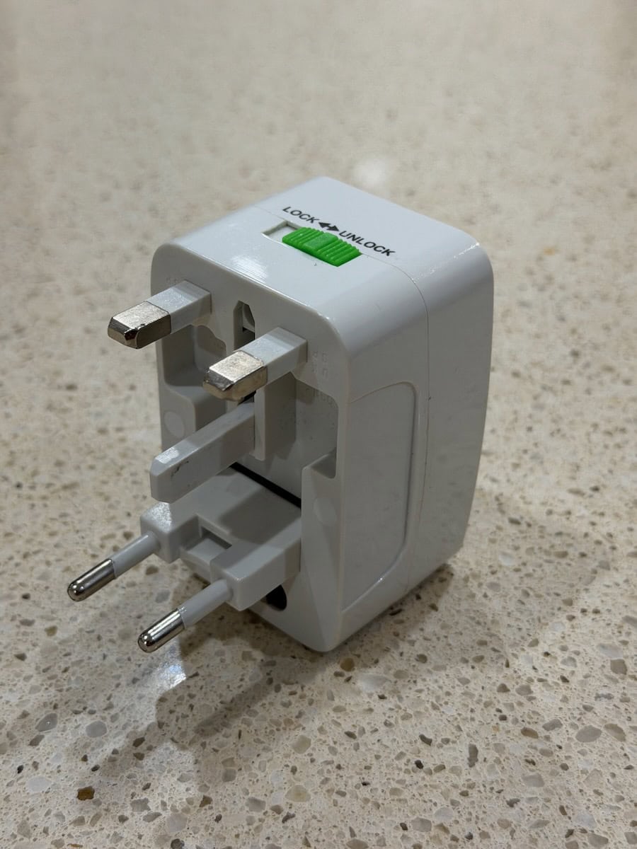 Universal travel adapter with both mainland Europe and UK plugs