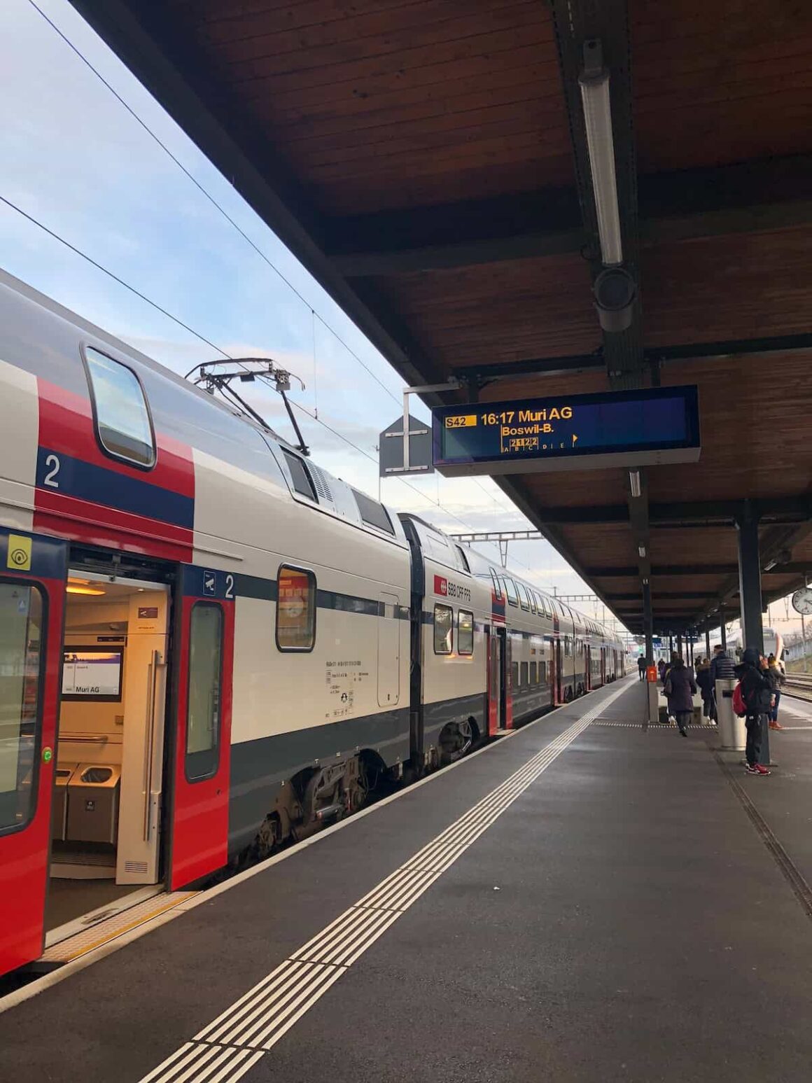 A local SBB train at the rural station Wohlen in Canton Aargau